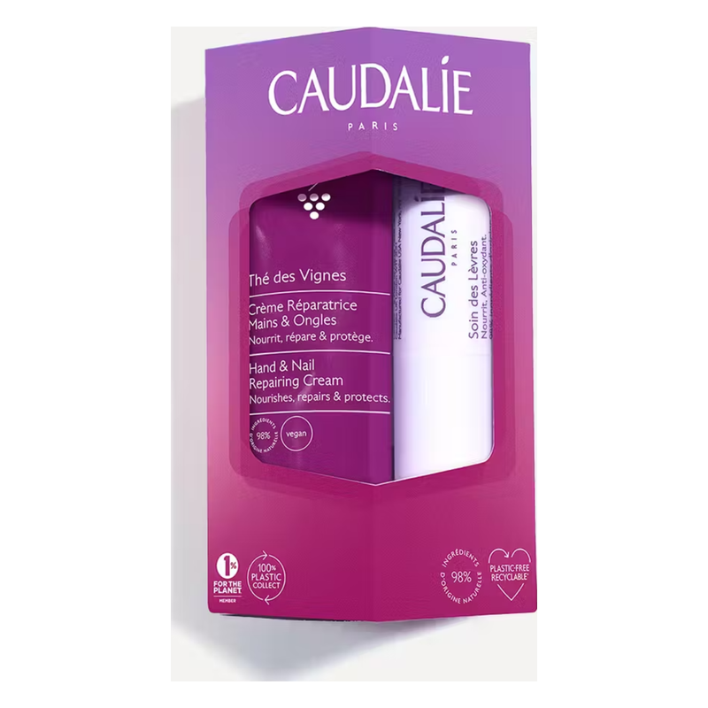 Verpackung mit zwei Pflegeprodukten von Caudalie: Hand- und Nagelcreme sowie Lippenbalsam, beide vegan und umweltfreundlich.