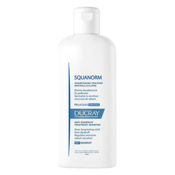 Weißer Flasche mit Shampoo gegen Schuppen, gekennzeichnet durch die Marke Ducray und den Produktnamen SQUANORM.