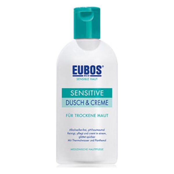 Flasche EUBOS Sensitive Dusch & Creme für trockene Haut mit grünem Deckel und Pflegehinweisen auf dem Etikett.