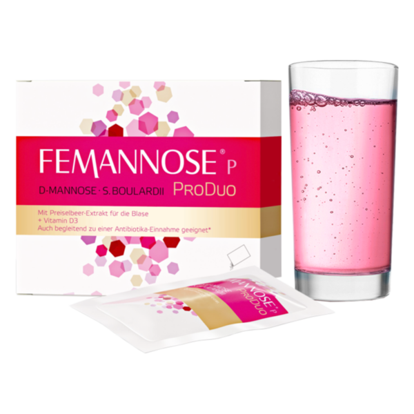 Verpackung von FEMANNOSE P mit einem Glas rosa Getränk daneben, das D-Mannose und Preiselbeer-Extrakt enthält.