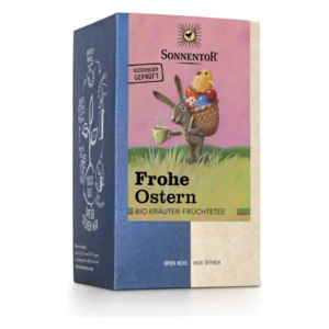 Verpackung eines BIO Kräuter-Früchtetees mit Ostermotiv, zeigt einen Hasen mit einer Tasse in der Hand und bunten Eiern.