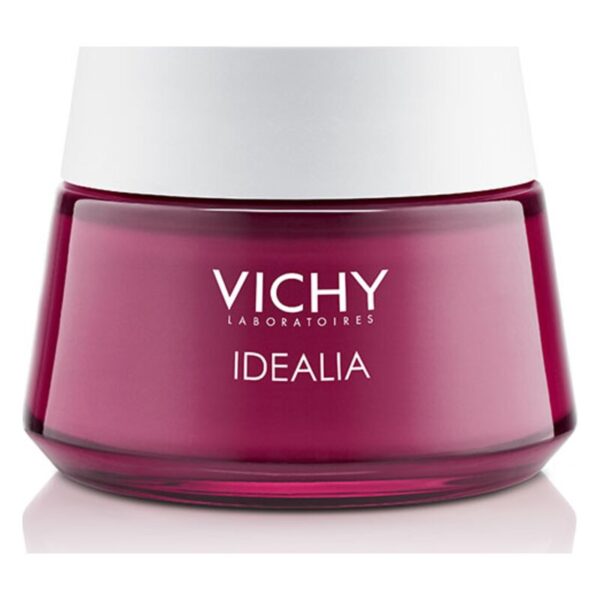 Runde Flasche mit pinkfarbener Creme und weißem Deckel, beschriftet mit "VICHY IDEALIA".
