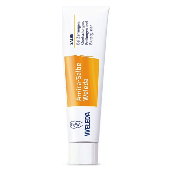 Tube mit Weleda Arnica-Salbe, genutzt zur Linderung von Zerrungen und Blutergüssen, mit weißer und orangefarbener Verpackung.