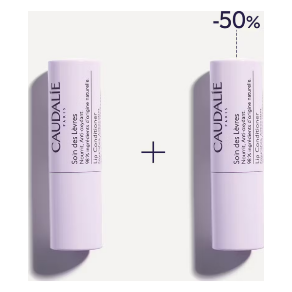 Zwei Lippenpflege-Balsame von CAUDALIE in lila Verpackung mit Hinweis auf 50% Rabatt. Schriftzug "Soin des Lèvres".