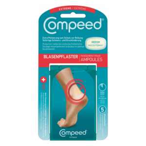 Verpackung eines Compeed Blasenpflasters in mittlerer Größe mit Bild eines Fußes und Beschreibung des Produkts.