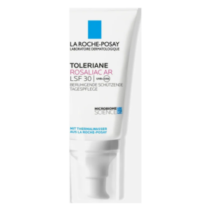 Gesichtspflegecreme in einer weißen Tube mit Pumpverschluss, mit LSF 30 und beruhigenden Eigenschaften.