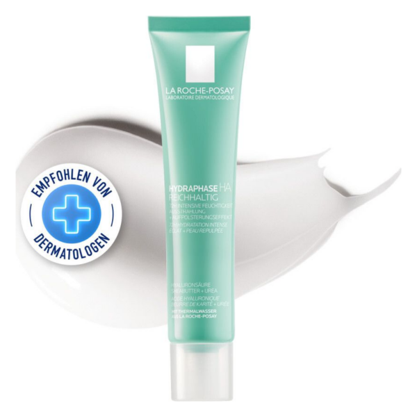 Hautcreme von La Roche-Posay in einer mintgrünen Tube mit dermatologischer Empfehlung und Creme auf einer weißen Fläche.